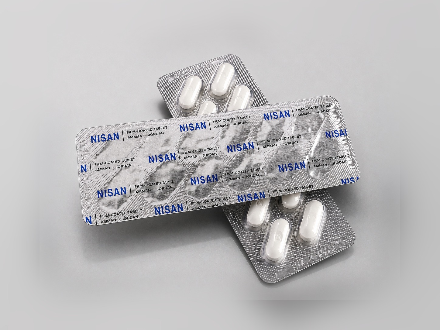 Unprinted aluminium blister pack with sealed tablets